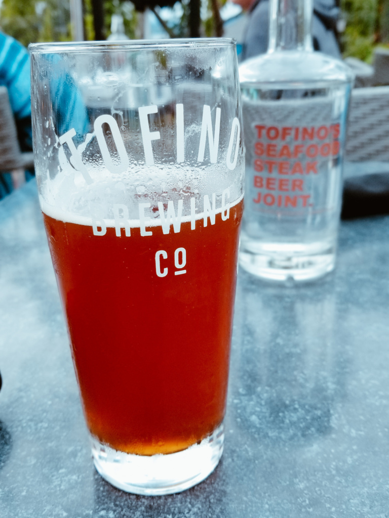 A pint of beer from Tofino Brewing Company partially drank.